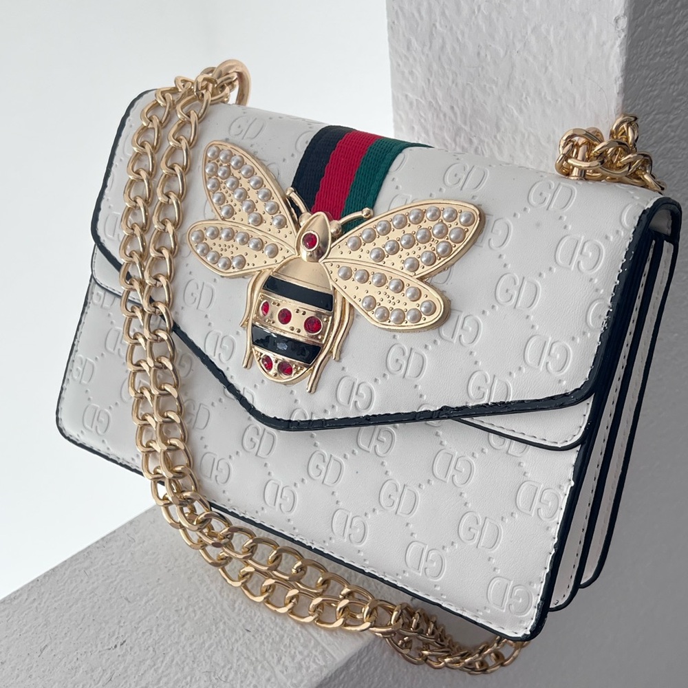 Elegant White Designer Bag with Gold Chain